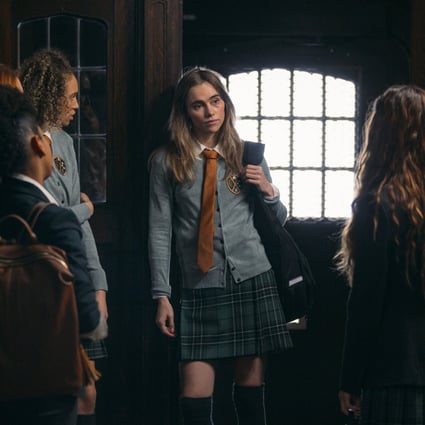 Suki Waterhouse (centre) plays a tough student in a still from Seance (category IIB), directed by Simon Barrett.