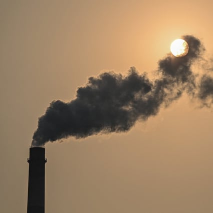 A view of a smokestack of the Wujing Coal-Electricity Power Station in Shanghai on September 28. Beijing is seeking to alleviate its energy crunch by ramping up domestic coal production and stepping up imports. Photo: AFP 