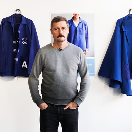 Pascal Anson poses with jackets he designed that are both wearable by and instructive for those living with dementia. They feature in the first OK Dementia Festival in Hong Kong. Photo: Enable Foundation