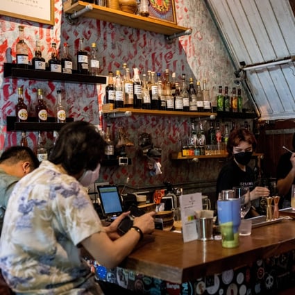 Customers at Teens of Thailand cocktail bar in Bangkok enjoy fruity mocktails as the Covid-19 alcohol ban continues there. Photo: AFP
