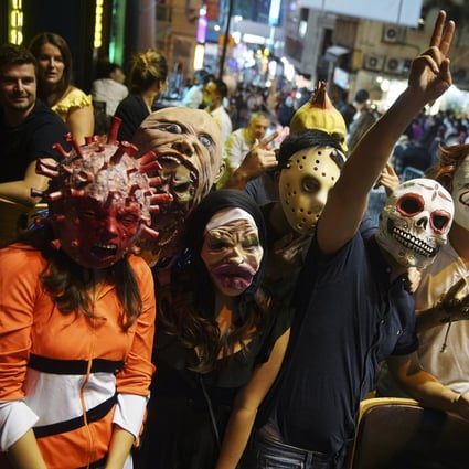 People dressed in various costumes enjoy Halloween night at Lan Kwai Fong in October, 2020. It’s columnist Andrew Sun’s worst nightmare. Photo: Winson Wong