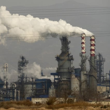 Steam rises from a coal processing plant in central China’s Shanxi Province. Photo: AP
