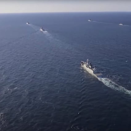 Naval vessels from China and Russia sail during a joint military drill in the Sea of Japan, in this video still released on October 18. Photo: Russian Defence Ministry/Reuters