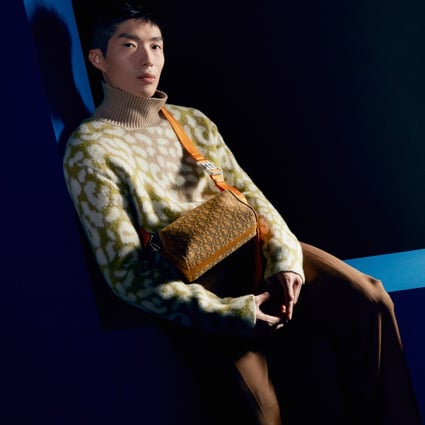 Hong Kong Olympic gold medal-winning fencer Cheung Ka-long in jumper (HK$22,000) and trousers with bag (HK$17,500) by Dior Men.