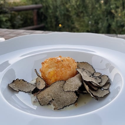Crumbed egg with black truffle at the Como Castello del Nero hotel in Tuscany, Italy, where visitors can arrange truffle-hunting experiences. Photo: Chris Dwyer