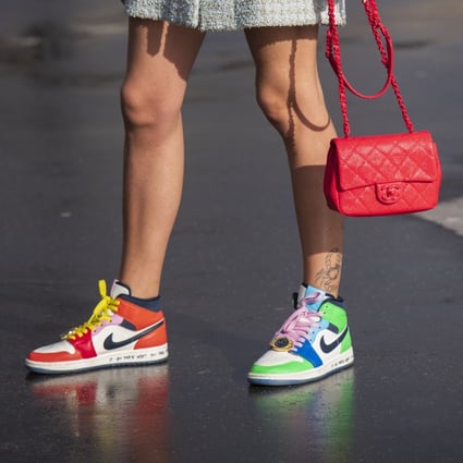 Nike sneakers featuring in street style in Paris, France. Photo: Getty Images