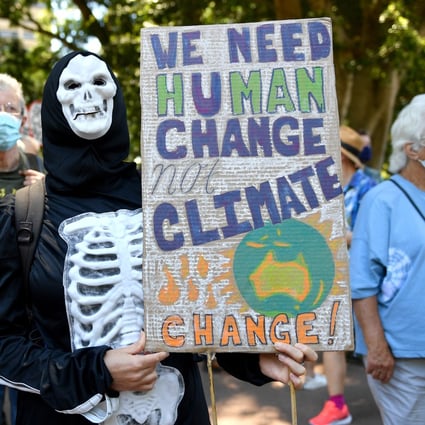 Protesters mark the Global Day of Action on Climate in Sydney, Australia, on November 6. Capital markets have a crucial role to play in driving companies along the path to net zero. Photo: AAP
