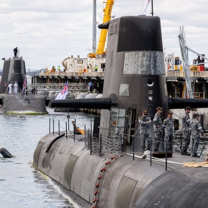 An Australian Collins class submarine docks in front of the UK’s nuclear-powered attack submarine HMS Astute at HMAS Stirling Royal Australian Navy base in Perth, Australia, on October 29. Under the Aukus alliance, the US and UK will help Australia build nuclear-powered submarines. Photo: EPA-EFE