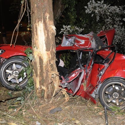 A car crash on Bride’s Pool Road in Hong Kong’s Tai Po district that left two people dead on October 29, 2013. Photo: SCMP