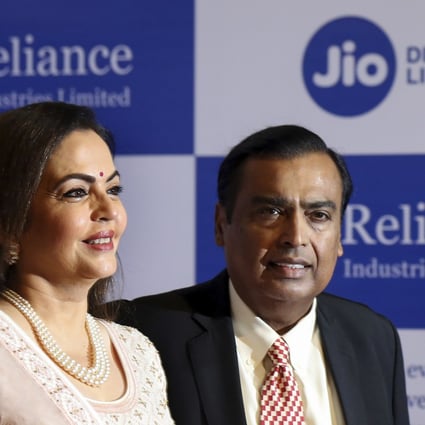 Chairman of Reliance Industries Limited Mukesh Ambani pictured with wife Neeta Ambani. File photo: AP
