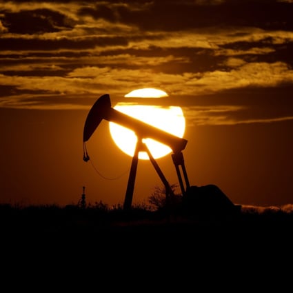 The sun sets behind an idle pump jack near Karnes City, Texas, US, on April 8, 2020. Opec+ has been reluctant – or perhaps unable – to increase production, which has helped drive crude prices ever higher amid a rebound in energy demand. Photo: AP 