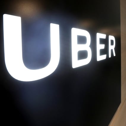 At least 35 Uber drivers have been fined for carrying passengers for reward without hire car permits.
Photo: Winson Wong