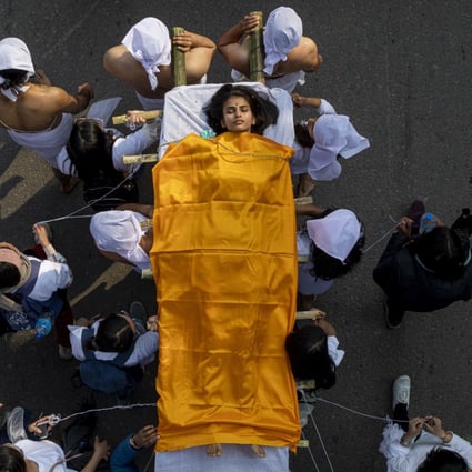 A mock funeral is staged in protest against rising cases of rape, murder and domestic violence against women in Kathmandu, Nepal, on February 12. Photo: EPA-EFE