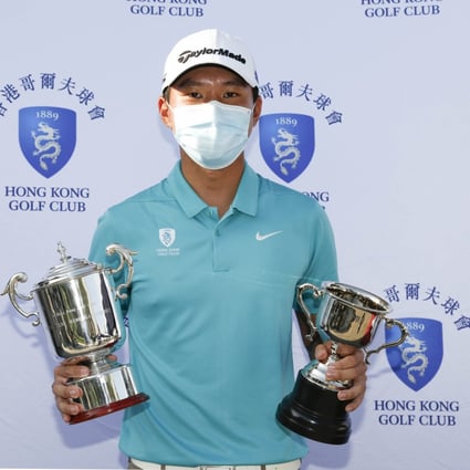 Terrence Ng poses with the HKGC-Peter Tang Memorial Trophy and the Fanling Trophy after his win. Photo: HKGC