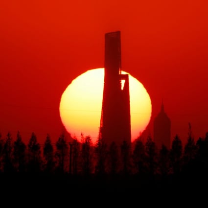 A view of skyscrapers Shanghai Jin Mao Tower and Shanghai World Financial Center are seen at sunset on Tuesday. Photo: Reuters