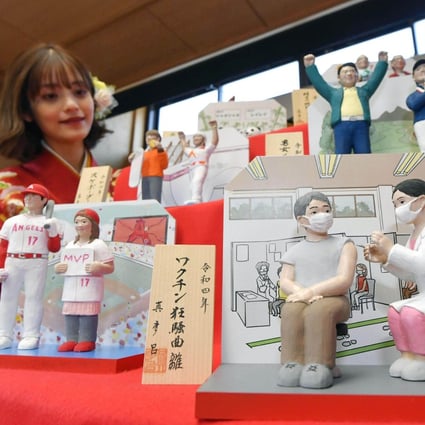 “Hina” dolls are unveiled by a doll maker in Tokyo, including a nurse giving a Covid-19 vaccine to a man. Japan is currently doing well in its fight against coronavirus, with only five new cases in its capital city on Wednesday. Photo: Kyodo