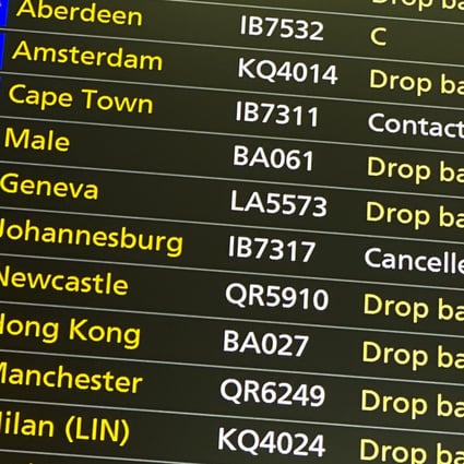 A departures screen displays a cancelled flight to Johannesburg at London Heathrow Airport on November 26. The UK is one of many countries to have banned flights from South Africa and other southern African countries, concerned passengers could be infected with the new “Omicron” variant. Photo: AP