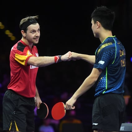 Germany’s Timo Boll (left), pictured after his round of 64 win over China’s Zhou Qihao, has reached the semi-finals of the World Championships in Houston. Photo: Xinhua