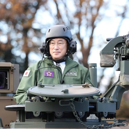 Japan’s Prime Minister Fumio Kishida at Camp Asaka in Tokyo on Saturday. Photo: AFP 