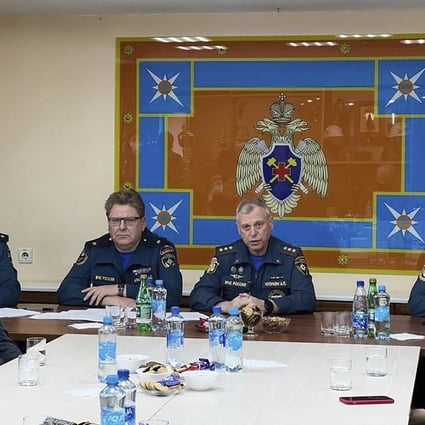 Russian Acting Minister of Emergency Situations Aleksandr Chupriyan, right, speaks during a meeting with relatives of rescuers who died during a rescue operation at the Listvyazhnaya coal mine, in Kemerovo, about 3,000 kilometres (1,900 miles) east of Moscow, Russia, on Saturday. Photo: AP