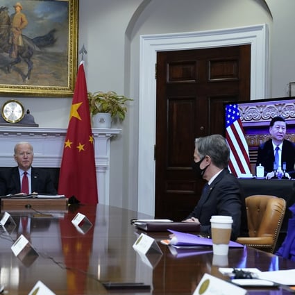 US President Joe Biden (left) speaks as he meets virtually with Chinese President Xi Jinping from the Roosevelt Room of the White House in Washington on November 15. Photo: AP