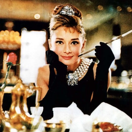 Audrey Hepburn in a still from Breakfast at Tiffany’s, adapted from a novella by Truman Capote. The film made the character Hepburn played, Holly Golightly, a style icon. Photo: Christie’s, Ronald Grant Archive