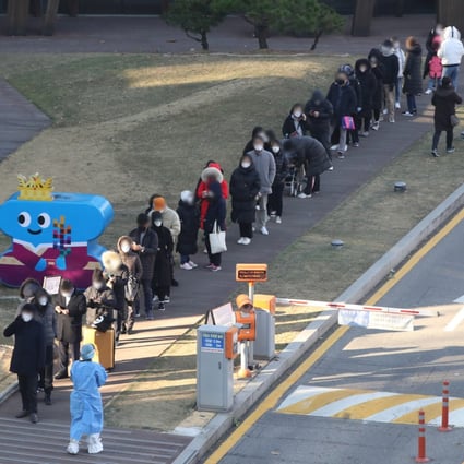 People wait in line to receive Covid-19 tests in Seoul, South Korea, on Wednesday. Photo: EPA-EFE