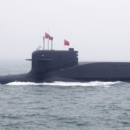 A Chinese submarine is seen in the sea near Qingdao in 2019. Photo: Mark Schiefelbien/AFP via Getty Images)