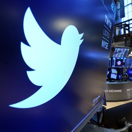 The logo for Twitter appears above a trading post on the floor of the New York Stock Exchange. Photo: AP