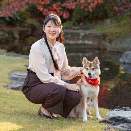 Princess Aiko with her pet dog Yuri: if the 20 year old decides to marry, she’ll be forced to leave the royal family. Photo: AFP