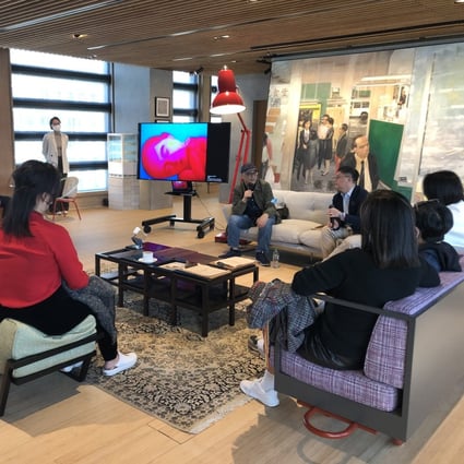 Chinese artist Zhang Xiaogang (wearing a cap) in conversation with Pi Li,  Sigg Senior Curator of M+, on December 2, 2021. The event was held at the M+ Lounge for  patrons of Hong Kong’s new museum of visual culture. Photo: Enid Tsui