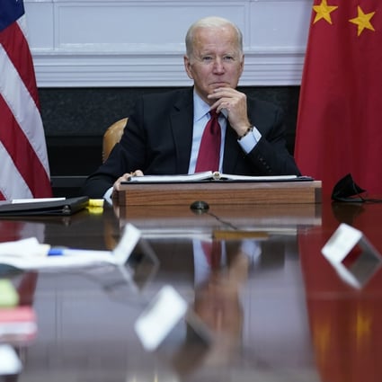 US President Joe Biden listens as he meets virtually with Chinese President Xi Jinping. Photo: AP