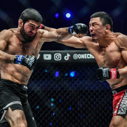 ‘Dagi’ (left) and Timofey Nastyukhin exchange punches at ONE: Winter Warriors. Photos: David Ash/ONE Championship