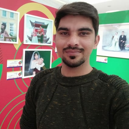 Rizwan Ali, pictured in Shandong in 2019, is now stuck in limbo - unable to go back to his old job in Pakistan and unable to return to China. Photo: Handout