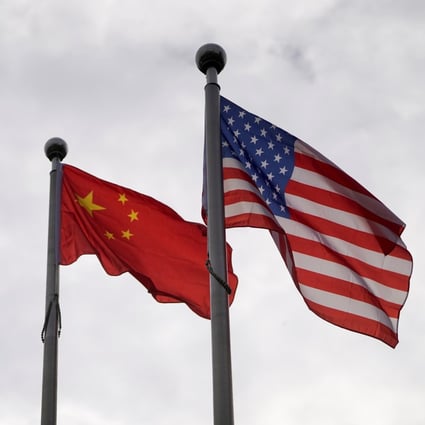 The Chinese and American flags. Power in Asia is increasingly a two-horse race, according to a new report. Photo: Reuters