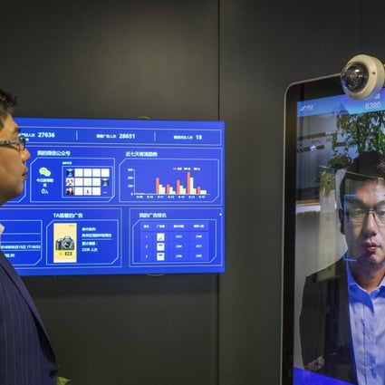 Xu Li, CEO of SenseTime, showcases its facial recognition system at its Beijing showroom in this file picture from 2018. Photo: Bloomberg