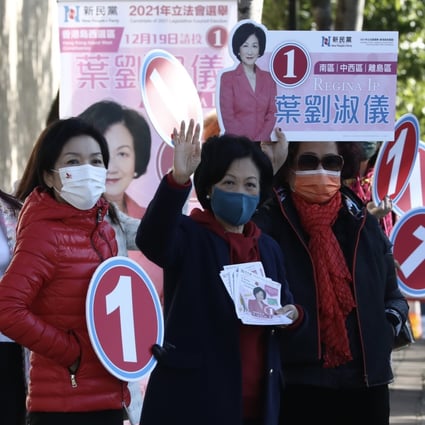 Regina Ip (second from right) and her supporters canvass for votes at The Peak on Friday. Photo: Jonathan Wong