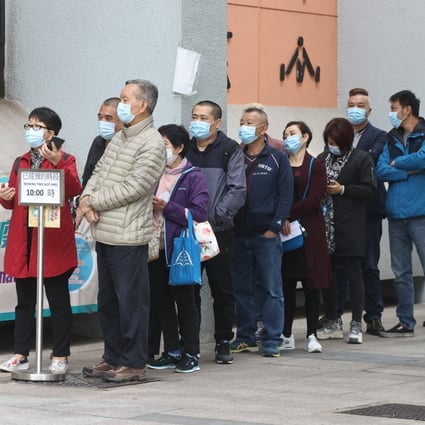 People queue for Sinovac vaccine jabs at Yuen Woo Road, Sha Tin. Photo: K. Y. Cheng