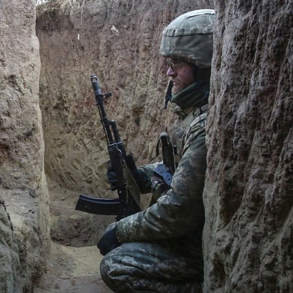A Ukrainian serviceman rests in a trench not far from the city of Horlivka, which is controlled by pro-Russian militants. The new US defence bill includes US$300 million for Ukraine’s military. Photo: EPA-EFE