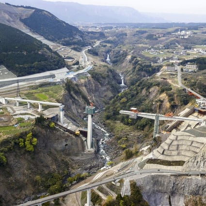 A photo taken on April 11, 2020,  shows Aso Ohashi bridge under reconstruction in the Kumamoto prefecture village of Minamiaso in southwestern Japan, which was brought down by a massive earthquake-triggered landslide in 2016. Photo: Kyodo