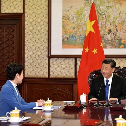 Carrie Lam last sat down with Xi Jinping in December 2019. Photo: ISD