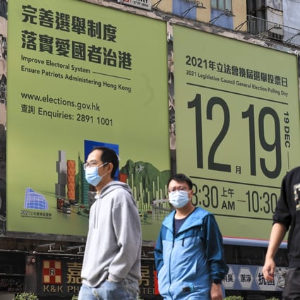Banners tout the coming 2021 Legislative Council election along Nathan Road in Mong Kok. Photo: Felix Wong