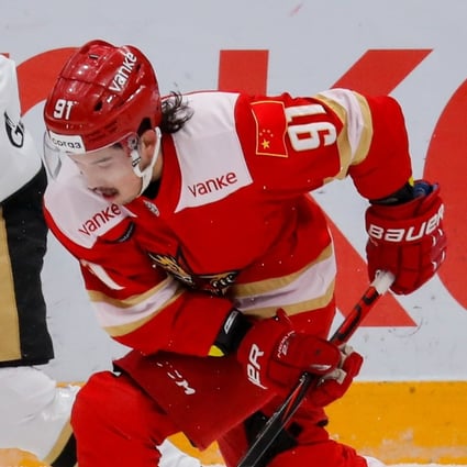 China’s HC Kunlun Red Star player Tyler Wong is seen in action against Vladimir Zharkov of HC Avangard during the Kontinental Hockey League (KHL) match in Mytishchi, Moscow region, Russia in November. Photo: Reuters 
