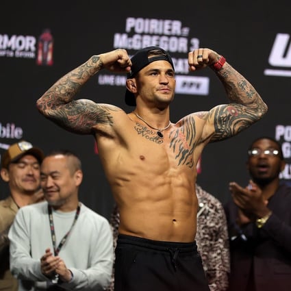 Dustin Poirier poses at the ceremonial weigh-in for UFC 264 in Las Vegas, Nevada. Photo: Stacy Revere/Getty Images/AFP. 