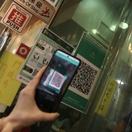 The “Leave Home Safe” app is used at a restaurant in Hong Kong’s Sheung Wan. Photo: Jonathan Wong