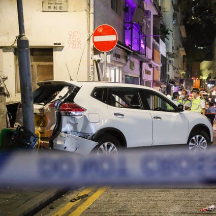 Eight people were injured, two of them critically, when a car jumped a curb in the Hong Kong nightlife district of SoHo on a busy Friday night. Photo: Edmond So