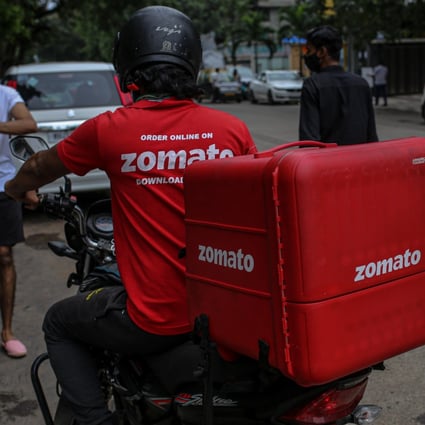 A Zomato delivery rider on a motorcycle in Mumbai, India. Photo: Bloomberg