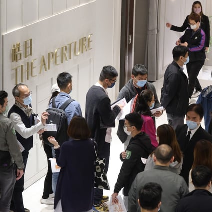People lining up for The Aperture development, built by Hang Lung Properties, in Kowloon Bay on 11 December 2021. Photo: May Tse