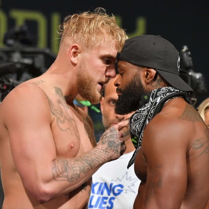 Jake Paul and Tyron Woodley face off during the weigh in before their fight in August. Photo: Getty Images