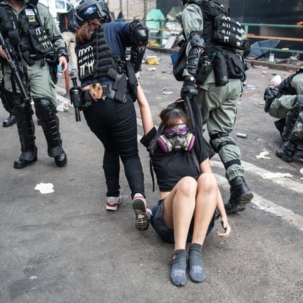 Police arrest anti-government protesters at Polytechnic University on November 18, 2019. Given the young age of those arrested, is it timely and worthy to consider an amnesty for movement-related prisoners not guilty of violent crime? Photo: Getty Images
